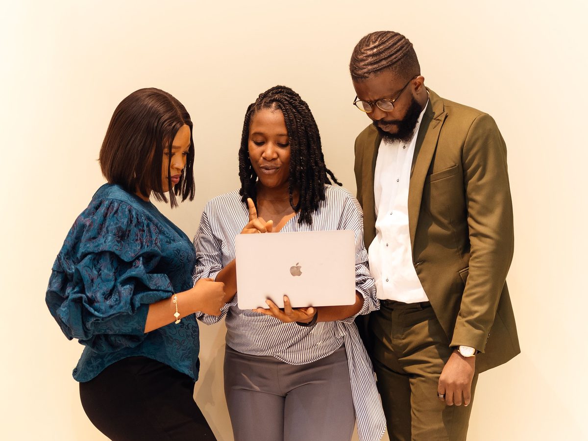 Africa 118 team reviewing a client's Google Business Profile together on a laptop